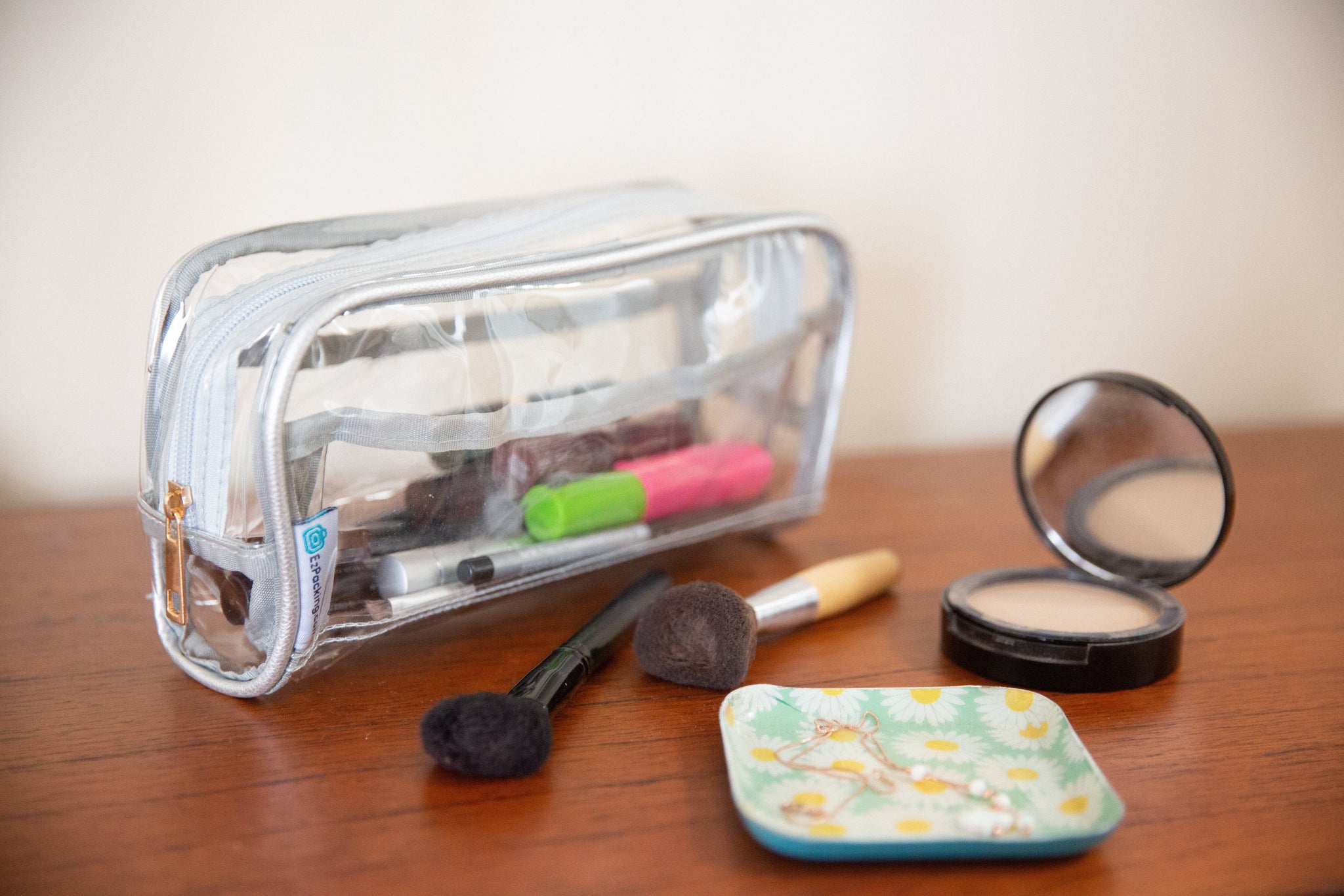 Clear makeup pouch with basic cosmetics